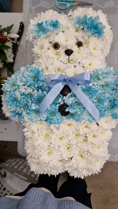 Little Blue Bear - A sweet teddy bear funeral tribute in blue and white, created as a loving and personal farewell.