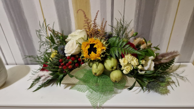 Autumn Harvest - A rustic seasonal arrangement filled with warm autumn colours and natural country-inspired touches.
