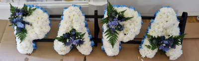 Letters - A personalised funeral tribute in classic white and blue tones, created as a loving farewell.